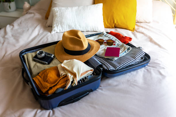 valise sur lit d’hôtel – risque d’introduction de punaises de lit